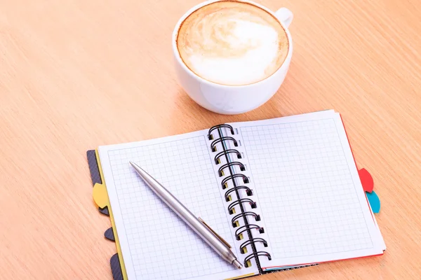 Open blank note book with coffee cup on table — Stock Photo, Image