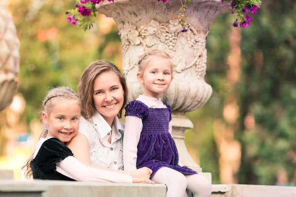 Happy family: mother with daughters — Stock Photo, Image