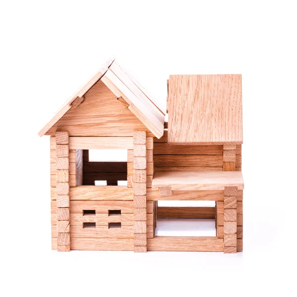 Houten huis speelgoed geïsoleerd op wit — Stockfoto