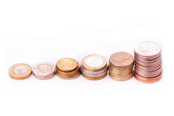 Different old coins stacked isolated — Stock Photo, Image