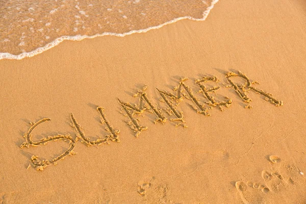 Word summer on the yellow sandy beach — Stock Photo, Image