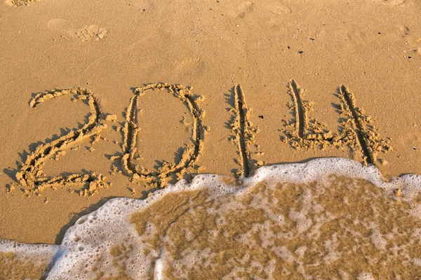 Números 2014 na praia de areia amarela — Fotografia de Stock