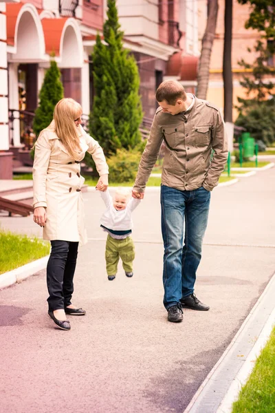 Happy family walking outdoor — Stock Photo, Image