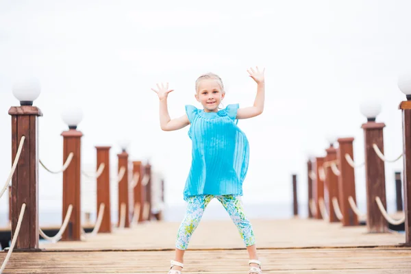Portrait of beautiful little girl jumping — Stock Photo, Image