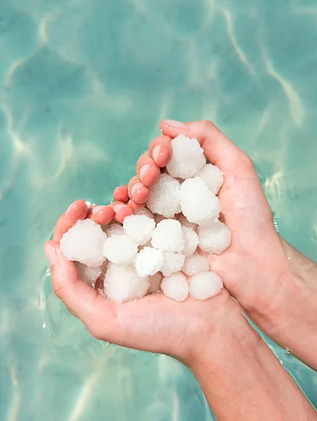 Hands Holding Sea Salt Crystals Heart Saped Sea Water Background — Stock Photo, Image