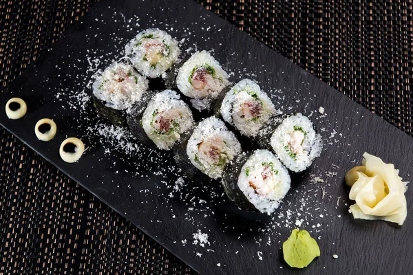 Sushi Roll Met Zeevruchten Avocado Een Stenen Plaat Donkere Achtergrond — Stockfoto