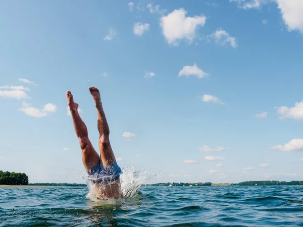 Person Diving Water View Human Legs —  Fotos de Stock