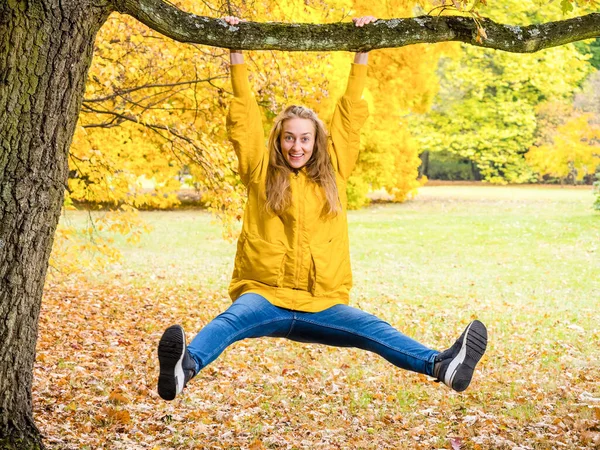 Young Funny Pretty Female Hanging Tree Having Fun Autumn Park — 图库照片