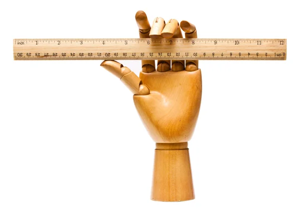Wooden hand and ruler — Stock Photo, Image