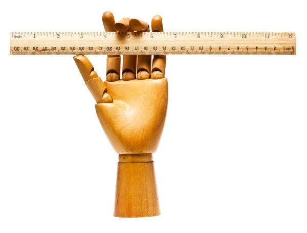 Wooden hand and ruler — Stock Photo, Image