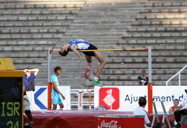 BARCELONA, ESPAÑA - 13 DE JULIO: Dmitry Kroytor en el salto de altura en el Campeonato Mundial de Atletismo Junior de la IAAF el 13 de julio de 2012 en Barcelona, España — Foto de Stock