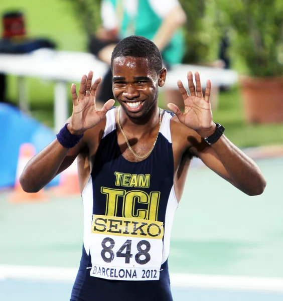 BARCELONA, SPAGNA - 13 LUGLIO: Delano Williams festeggia la vittoria della finale dei 200 metri ai Campionati Mondiali IAAF Junior 2012 il 13 luglio 2012 a Barcellona, Spagna . — Foto Stock