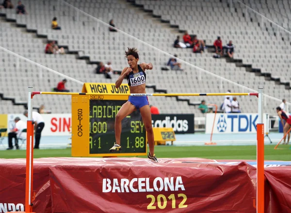 Yüksek atlamacı lissa labiche dan Seyşeller gümüş madalya olarak yüksek atlama üzerinde 2012 IAAF Dünya Gençler Atletizm Şampiyonası 15 Temmuz 2012 Barcelona, İspanya. — Stok fotoğraf