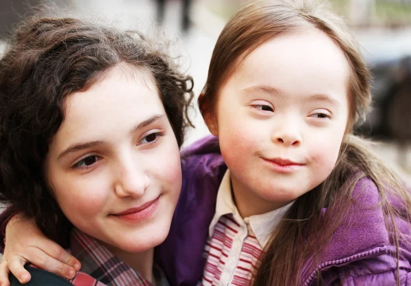 Little girl with sister — Stock Photo, Image