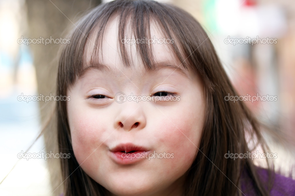 Portrait of beautiful young happy girl