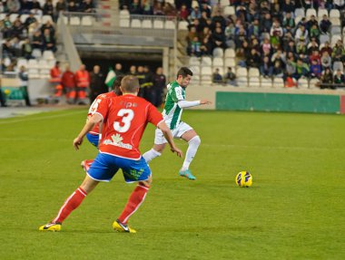 CORDOBA, SPAIN - JANUARY 13: Cristian García W(7) in action during match league Cordoba(W) vs Numancia (R)(1-0) at the Municipal Stadium of the Archangel on January 13, 2013 in Cordoba Spain