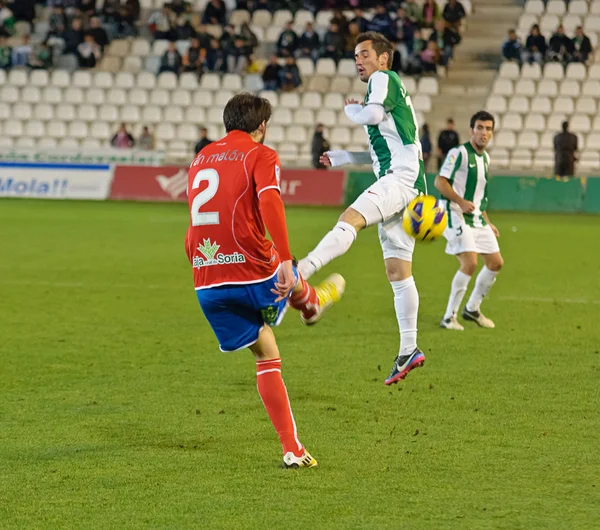 CORDOBA, SPAIN - JANUARY 13: Iván Malón R(2) in action during match league Cordoba(W) vs Numancia (R)(1-0) at the Municipal Stadium of the Archangel on January 13, 2013 in Cordoba Spain — Stock Fotó