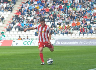 CORDOBA, SPAIN - MARCH 17:Christian Fernández R(18) in action during match league Cordoba(W) vs Almeria (R)(4-1) at the Municipal Stadium of the Archangel on March 17, 2013 in Cordoba Spain