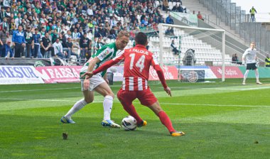 CORDOBA, SPAIN - MARCH 17: Iago Falqué R(14) in action during match league Cordoba(W) vs Almeria (R)(4-1) at the Municipal Stadium of the Archangel on March 17, 2013 in Cordoba Spain