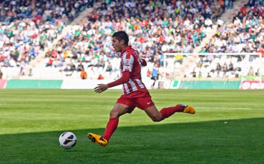 CORDOBA, SPAIN - MARCH 17: Iago Falqué R(14) in action during match league Cordoba(W) vs Almeria (R)(4-1) at the Municipal Stadium of the Archangel on March 17, 2013 in Cordoba Spain