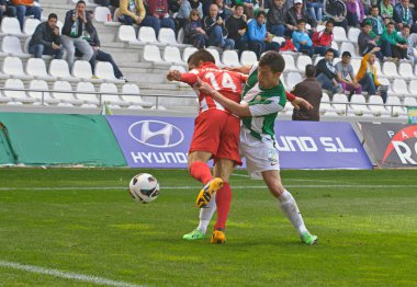 Cordoba, İspanya - Mart 17:carlos cakır w(21) eylem maçı lig cordoba(w) vs almeria (r)(4-1) baş melek üzerinde 17 Mart 2013 cordoba İspanya Belediye Stadyumu