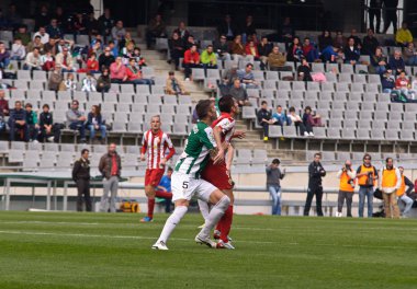 Cordoba, İspanya - Mart 17:armando lozano w(5) eylem sırasında maç lig cordoba(w) vs almeria (r)(4-1) baş melek üzerinde 17 Mart 2013 cordoba İspanya Belediye Stadyumu