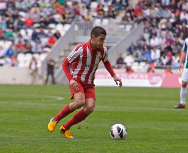 CORDOBA, SPAIN - MARCH 17: Iago Falqué R(14) in action during match league Cordoba(W) vs Almeria (R)(4-1) at the Municipal Stadium of the Archangel on March 17, 2013 in Cordoba Spain