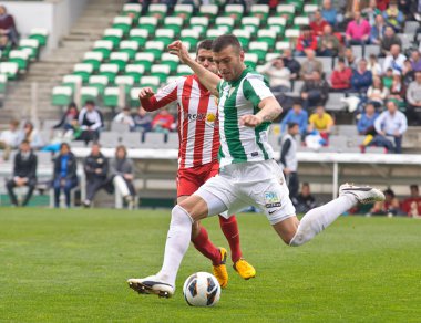 Cordoba, İspanya - Mart 17:armando lozano w(5) eylem sırasında maç lig cordoba(w) vs almeria (r)(4-1) baş melek üzerinde 17 Mart 2013 cordoba İspanya Belediye Stadyumu