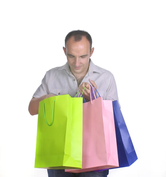 Uomo alla ricerca shopping bag — Foto Stock