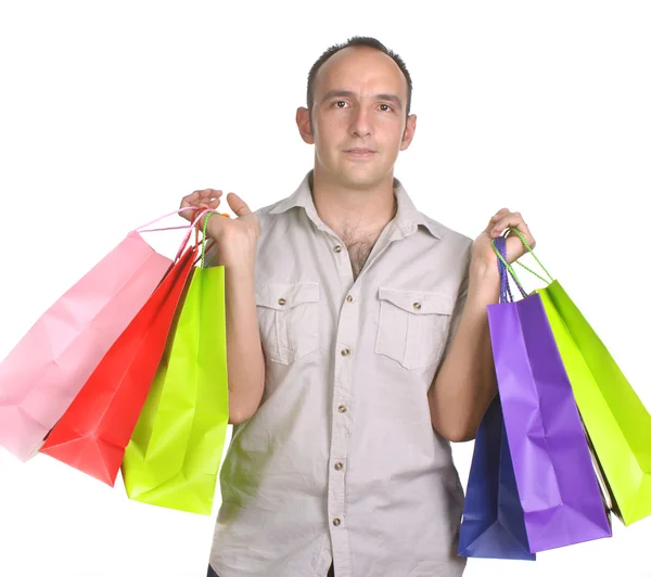 Uomo con diverse borse della spesa — Foto Stock
