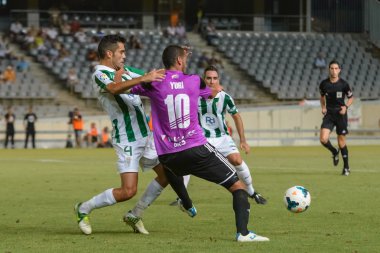 CORDOBA, SPAIN - AUGUST 18: Iago Bouzón W(4) in action during match league Cordoba (W) vs Ponferradina (B)(1-0) at the Municipal Stadium of the Archangel on august 18, 2013 in Cordoba Spain
