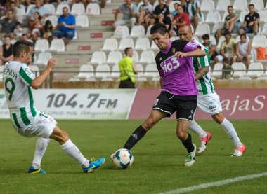 CORDOBA, SPAIN - AUGUST 18: Òscar Ramárez B(20) in action during match league Cordoba (W) vs Ponferradina (B)(1-0) at the Municipal Stadium of the Archangel on august 18, 2013 in Cordoba Spain