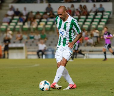 CORDOBA, SPAIN - AUGUST 18: Rául Bravo W(14) in action during match league Cordoba (W) vs Ponferradina (B)(1-0) at the Municipal Stadium of the Archangel on august 18, 2013 in Cordoba Spain