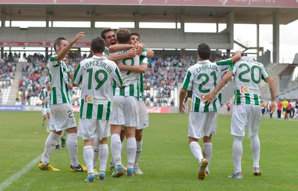 CORDOBA, SPAGNA - 29 SETTEMBRE: I giocatori di Cordoba festeggiano il gol durante la partita di campionato Cordoba (W) vs Girona (B) (2-0) allo stadio comunale dell'Arcangelo il 29 settembre 2013 a Cordoba Spagna Foto Stock Royalty Free