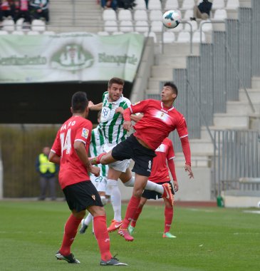 Cordoba, İspanya - 29 Mart: maç sırasında eylem pelayo w(24) Ligi cordoba (w) vs murcia (r)(1-1) baş melek 29 Mart 2014 tarihinde Belediye Stadyumu
