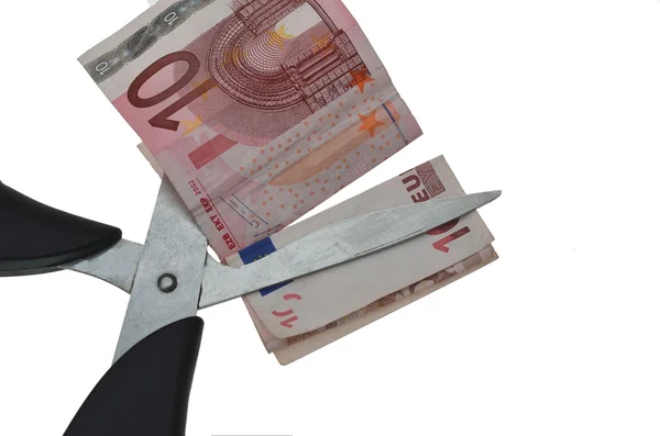 Euro being cut in two by Scissors — Stock Photo, Image