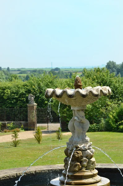 Fountain in classical english garden — Stock Photo, Image