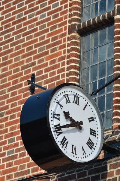 Old clock with brickwork — Stock Photo, Image
