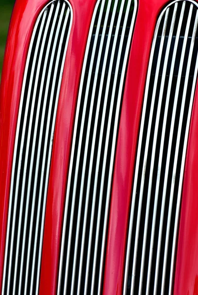 Red car radiator grill in portrait — Stock Photo, Image