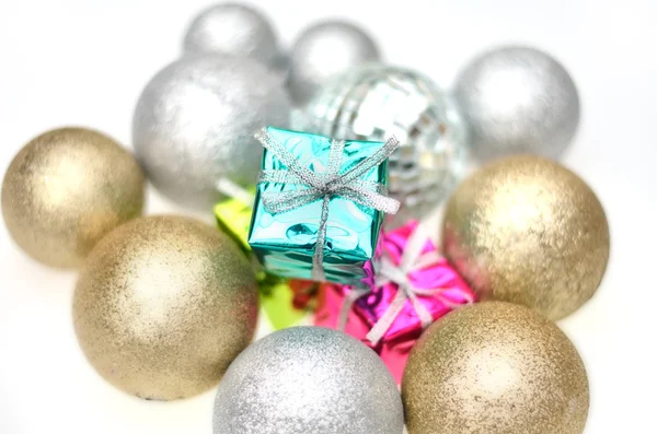 Focus on Christmas gift box with baubles — Stock Photo, Image