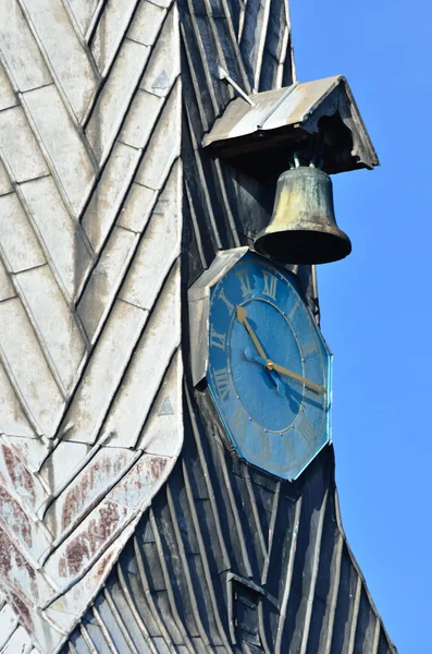Bell and clock in close up — Stock Photo, Image