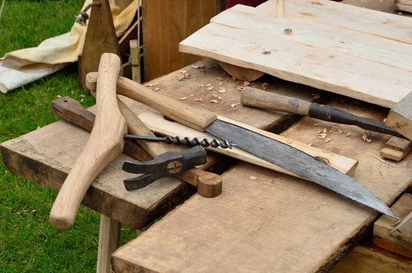 Old fashioned capenters bench with tools — Stock Photo, Image