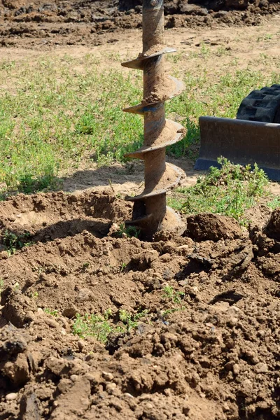 Bouw boor in veld — Stockfoto