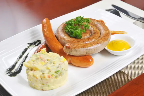 German sausage and salad — Stock Photo, Image