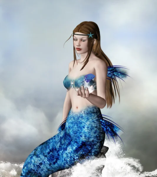 Beautiful mermaid on a rock — Stock Photo, Image