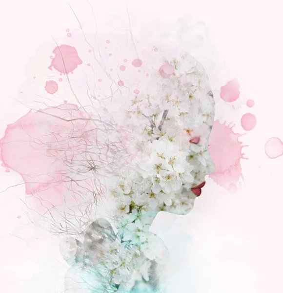 Soft profile of a woman outline with cherry blossom flowers, branches and color stains