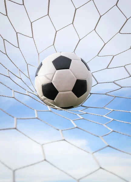 Football in the goal net — Stock Photo, Image