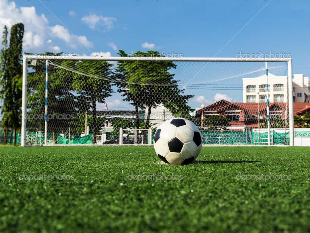 Soccer Ball On Green Grass In Front Of Goal Net Stock Photo Image By C Tungphoto Soccer Ball On Green Grass In Front Of Goal Net Stock Photo Image By C Tungphoto