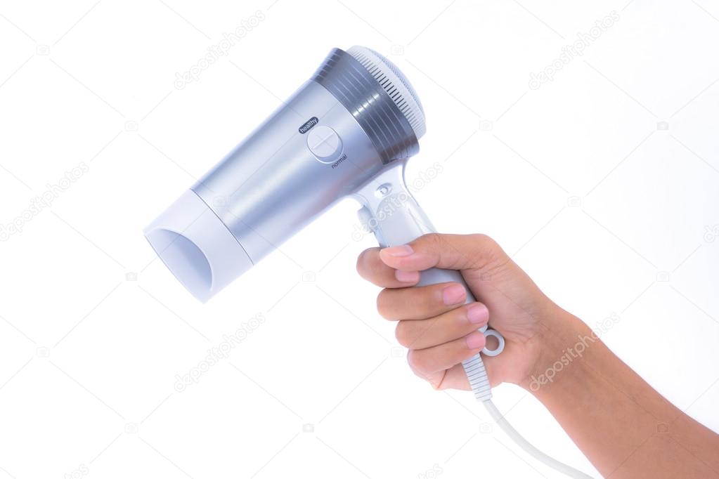 Hand holding hair dryer isolated on white background