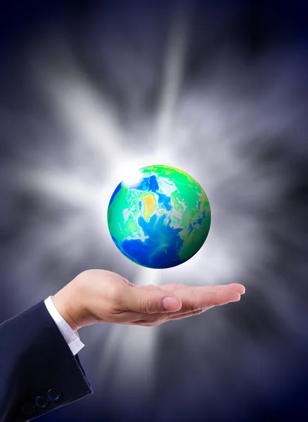 Earth globe in hand — Stock Photo, Image